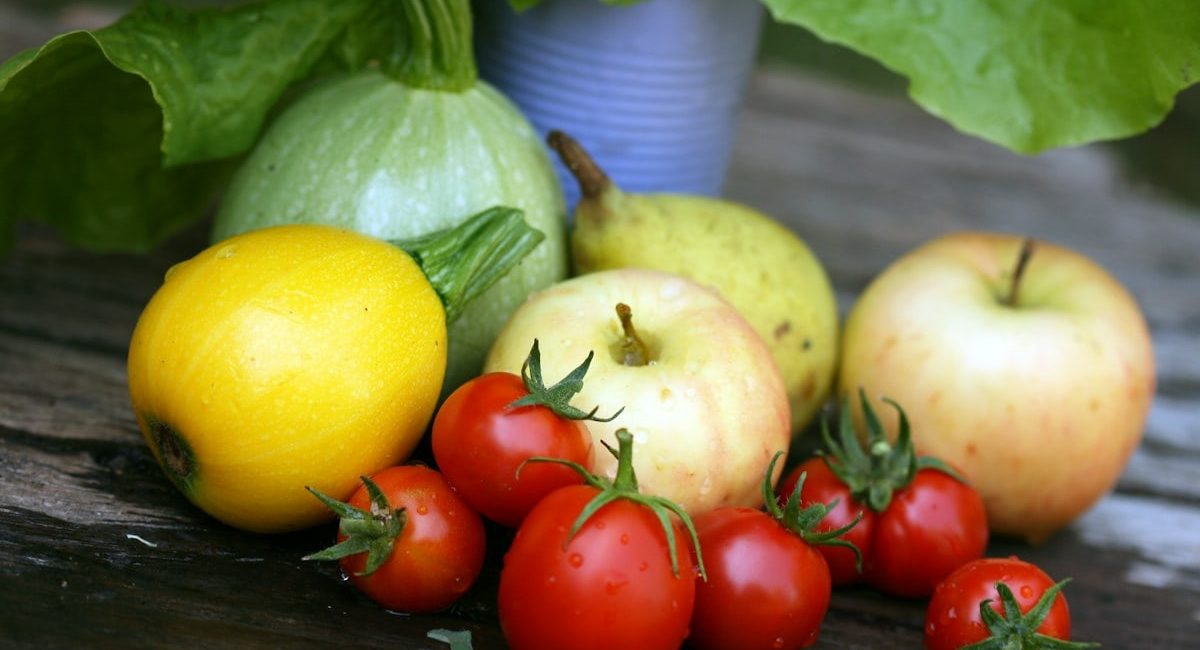 Close up of harvested vegetables and fruit.