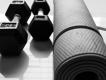 Two Dumbbells and exercise mattress on the floor